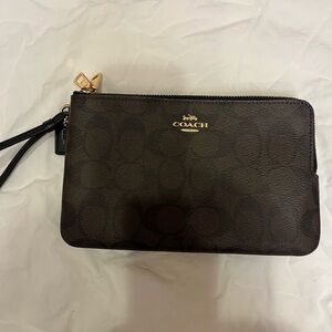 Coach double L-zip wristlet in black/ brown signature canvas.